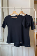 Produktové foto merino trička s krátkým rukávem na stojanu